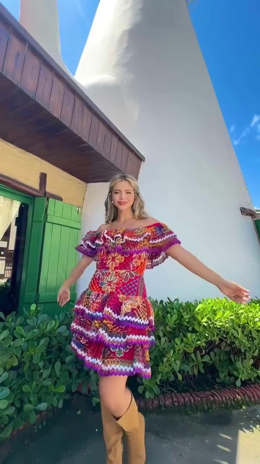 Colorful hand-crocheted off-the-shoulder dress